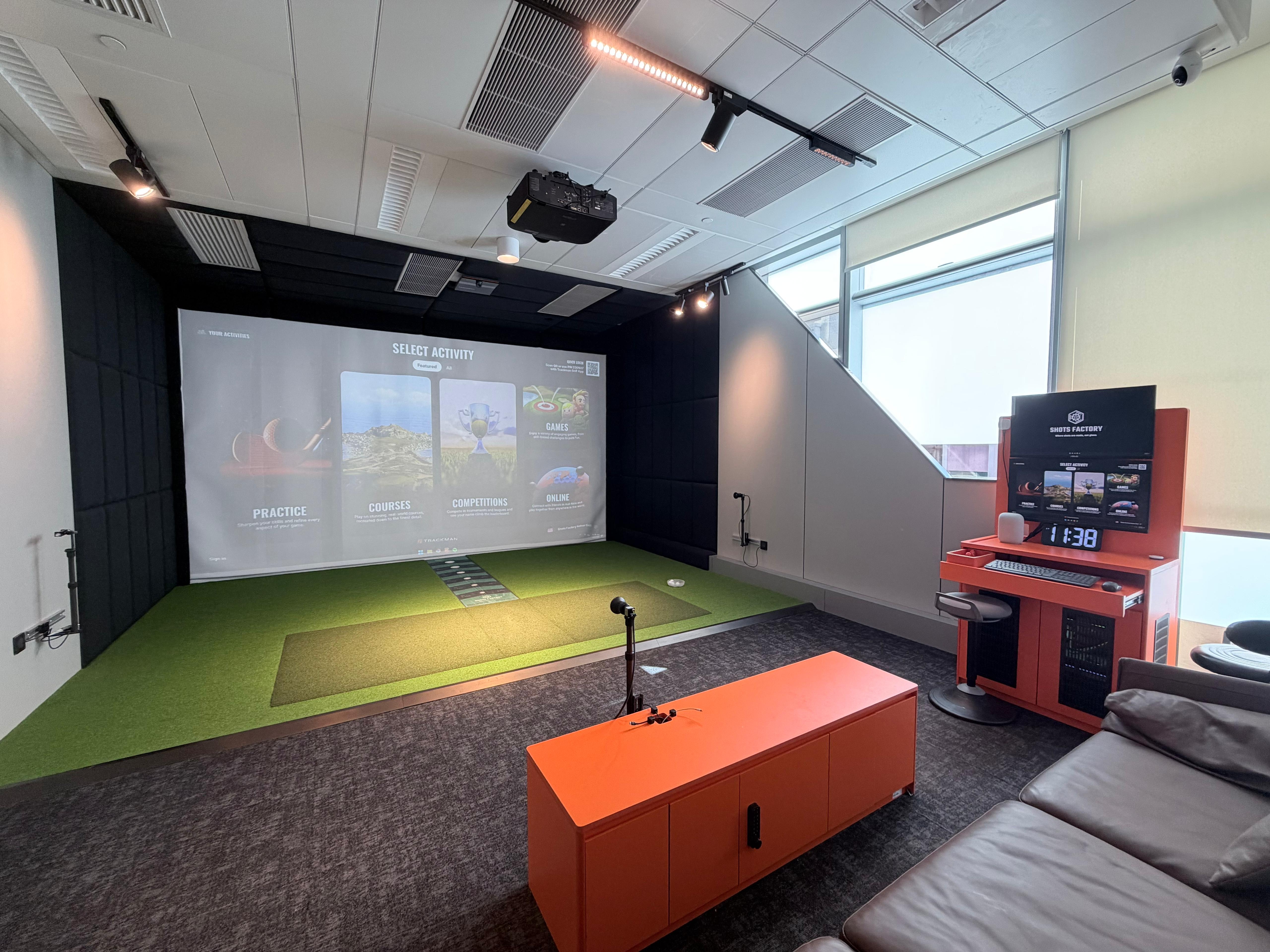 Shots Factory Wanchai indoor golf simulator bay with TrackMan driving range alternative in Hong Kong